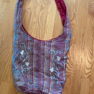 Zipper closure cross body bag.